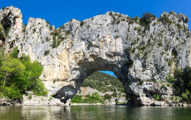 The Pont d'Arc is a large natural bridge in Ardeche canyon, France clipart