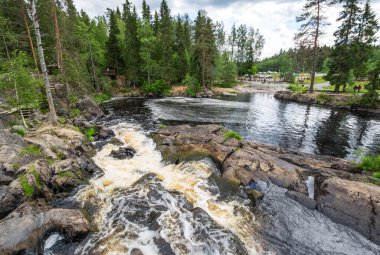 View of Ahvenkoski waterfall in the Republic of Karelia, Russia clipart