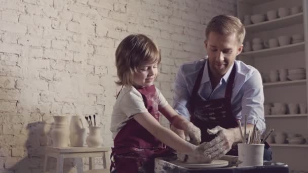 Little Boy Father Pottery — Stock Video