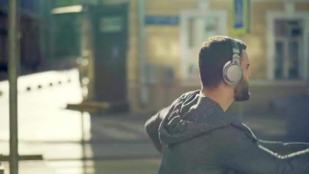 Young Man Headphones Outdoors — Stock Video