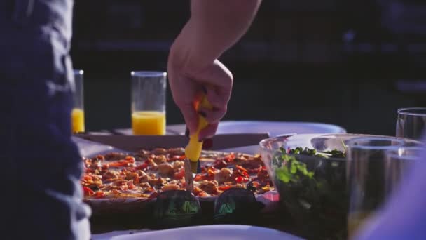 Young Girl Cutting Pizza Party — Stock Video