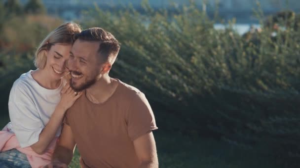 Embracing Young Couple Outdoors — Stock Video