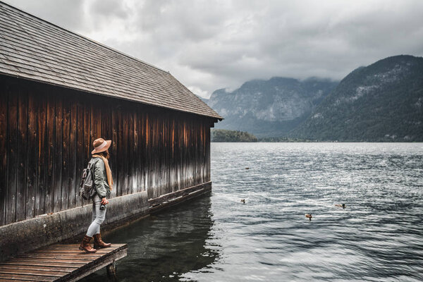 Young tourist on a wooden pier