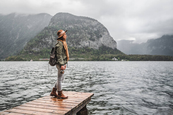 Attractive woman with a camera on vacation