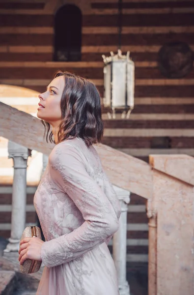 Smiling girl in a romantic dress — Stock Photo, Image