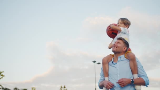 Father Son Playing Basketball Outdoors — Stock Video