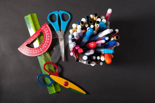 Pens Pens Pencils Ruler Scissors Plastic Jar Dark Background — Stock Photo, Image