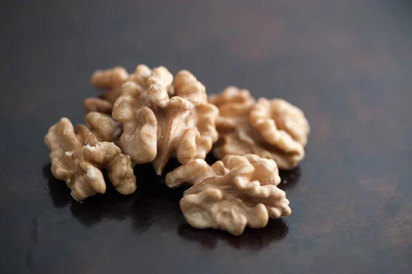 Walnuts on dark background — Stock Photo, Image