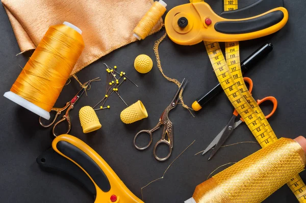 Yellow sewing measuring tape on dark — 스톡 사진