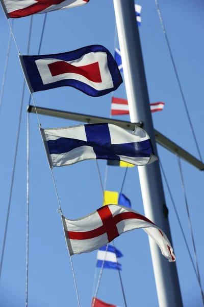 Sea flags fluttering in the wind — стоковое фото