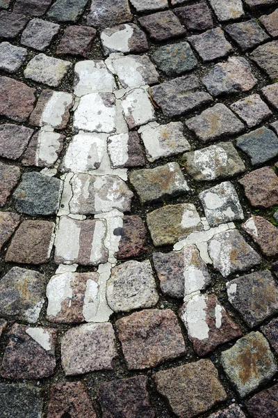 Pedestrian walkway sign on cobblestone pavement — Stock Photo, Image