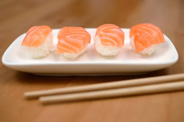 Chopsticks Sushi Salmon Bamboo Mat — Stock Photo, Image