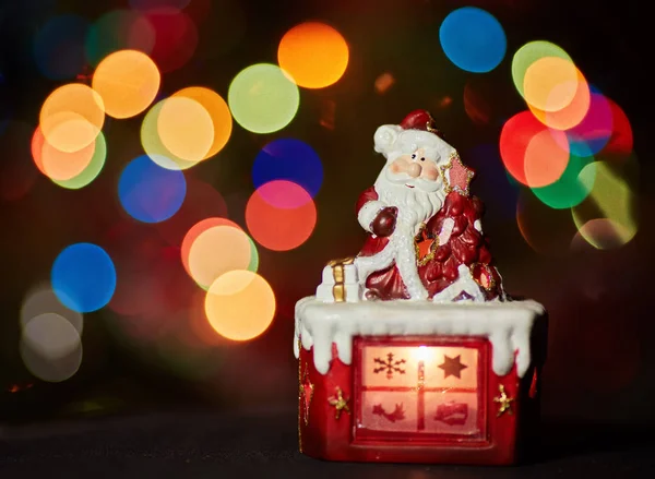 Santa Claus Soška Dělá Cvičení Čeká Vánoce Barevný Bokeh — Stock fotografie