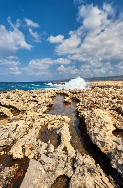 Big waves break about the Rocky Peninsula of Cape Lara in southern Akamas, Cyprus