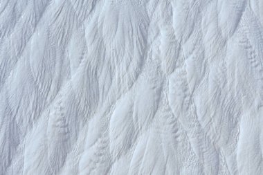 Pamukkale travertenleri dokulu arka plan, Pamukkale Denizli Türkiye'de.