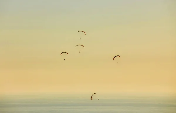 Silhouette Powered Paraglider Soaring Flight Sea Marvellous Orange Sunset Sky — Stock Photo, Image