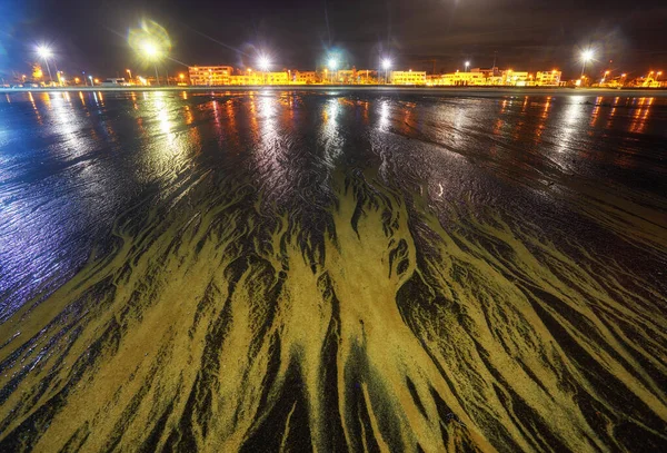 Imagem de fundo de uma mistura de areia amarela e preta — Fotografia de Stock