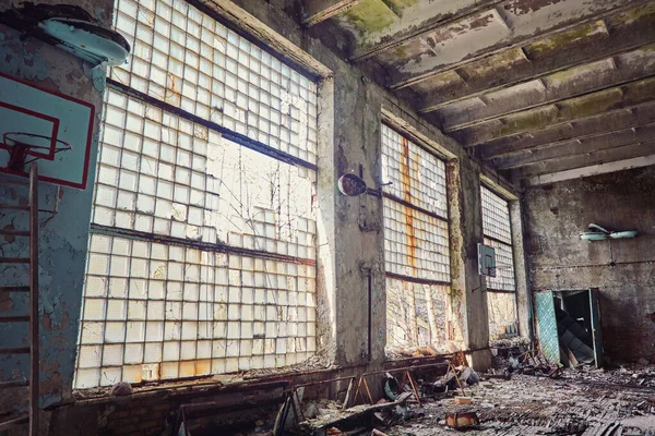 Abandoned school in Pripyat, Chernobyl zone. Abandoned gym.