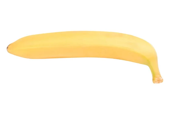 Een rauwe gele banaan geïsoleerd op een droge zonnige dag — Stockfoto