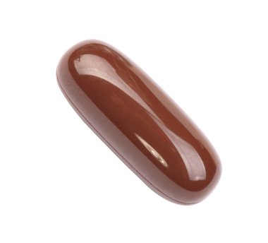 Beyaz arka planda izole edilmiş kahverengi jelatinli bir hap.