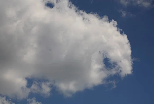 stock image cloud on blue sky