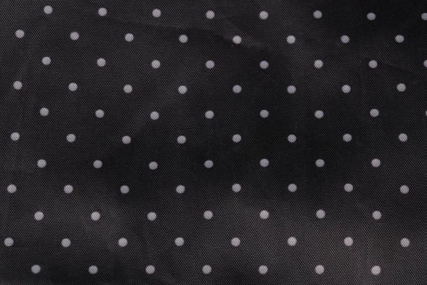 Latar belakang kain hitam dengan titik putih — Stok Foto
