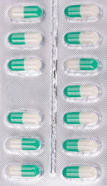 Many Tablets in Blister Isolated — Stock Photo, Image