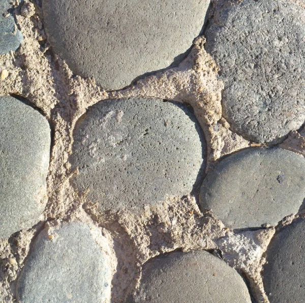 Cobblestone background at day — Stock Photo, Image