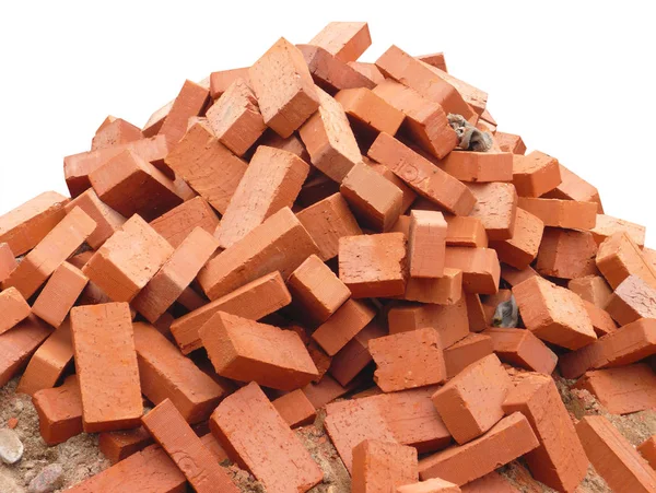 Heap of red brick isolated — Stock Photo, Image