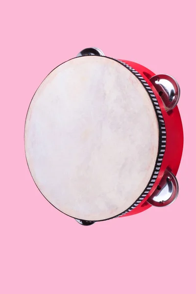 Tambourine isolated on pink — Stock Photo, Image