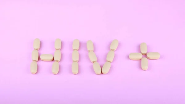 Pembe arka planda HIV terapisi efavirenz — Stok fotoğraf