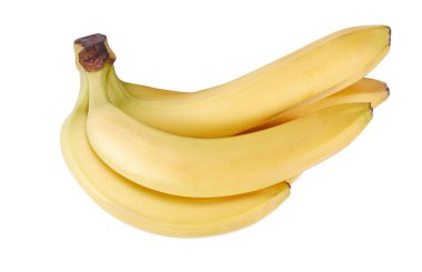 Kuru güneşli bir günde soyutlanmış bir sürü sarı muz.