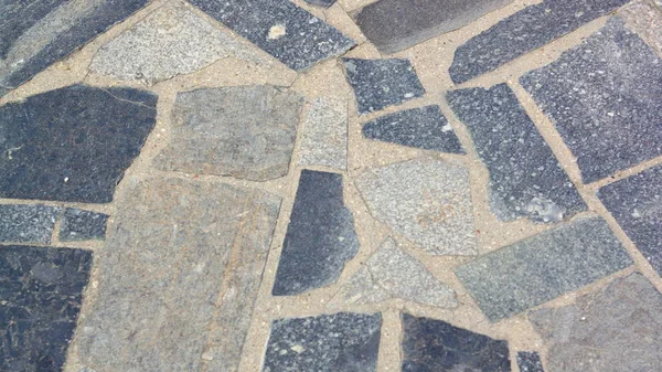 Granite floor at dry sunny day — Stock Photo, Image