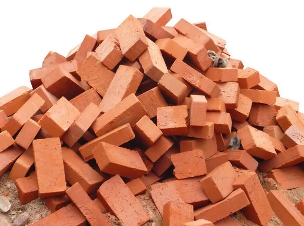 Heap of red brick isolated — Stock Photo, Image