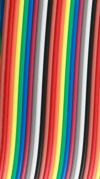 Many wire ribbon cable at dry sunny day — Stock Photo, Image