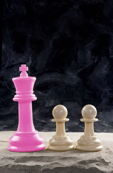 Pink King and his Pawns. — Stock Photo, Image