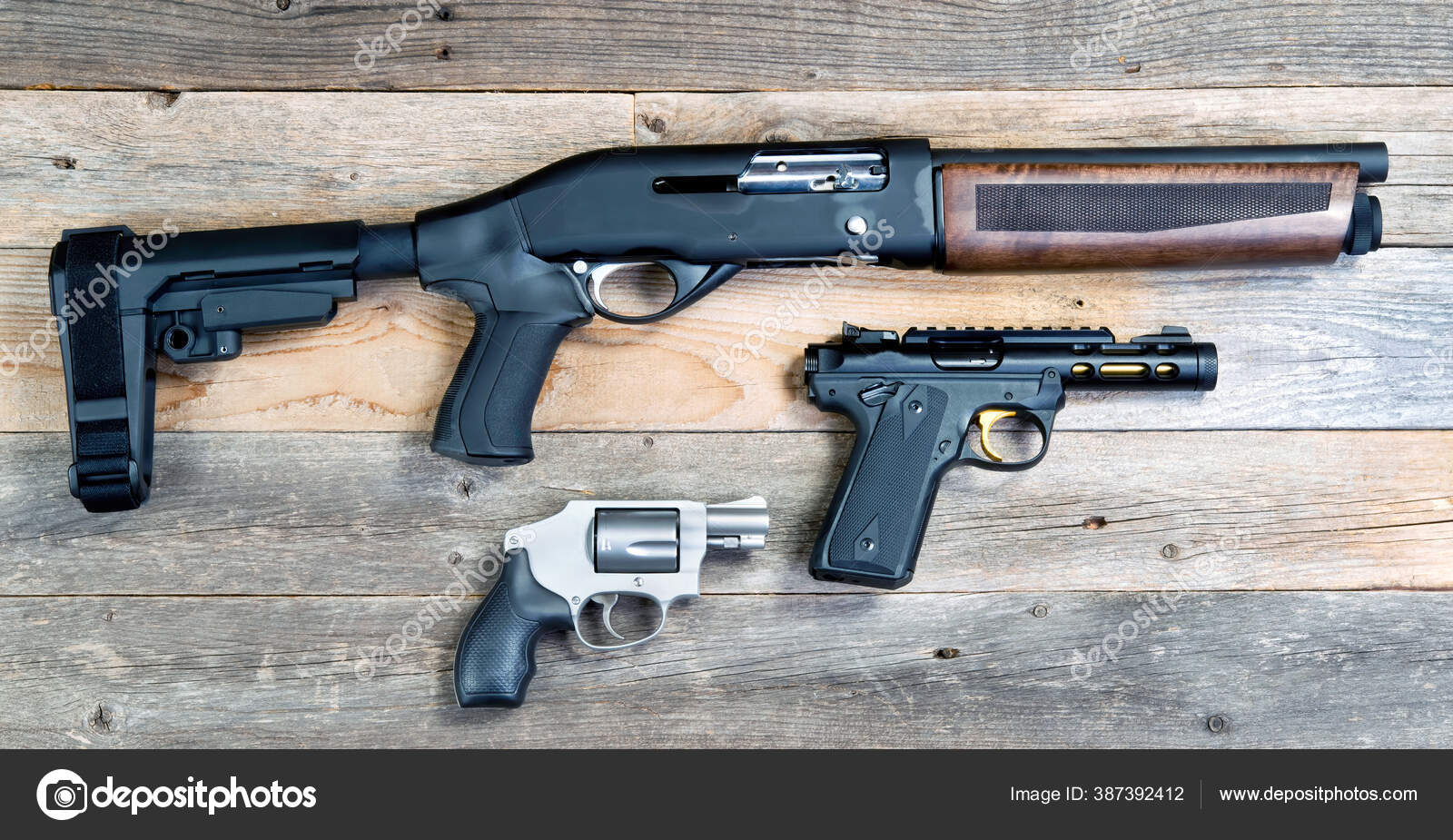 Home Security Shotgun Revolver Semi Automatic Pistol Stock Photo by