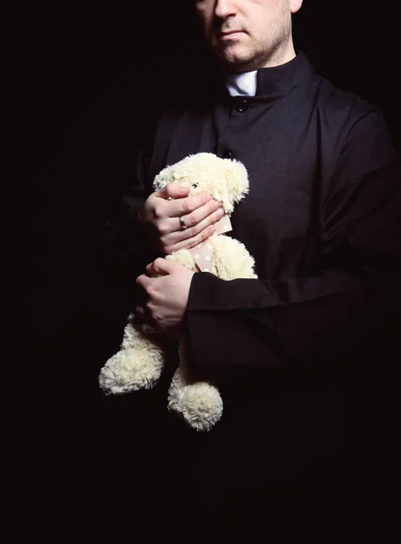 Priest Holding Teddy Bear — Stock Photo, Image