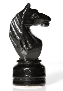 Beyaz arkaplanda satranç taşı