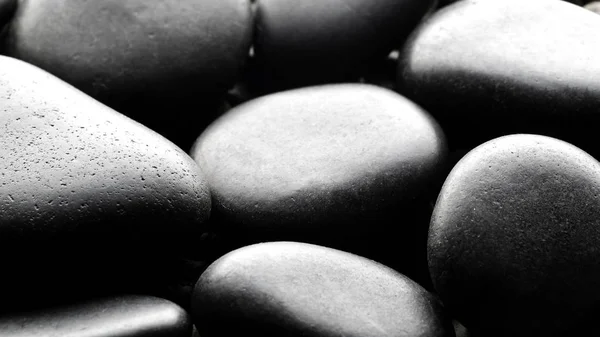 Black Pebbles Background Backlite — Stock Photo, Image