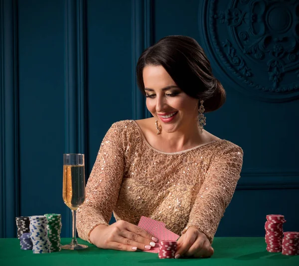 Young woman playing in the casino