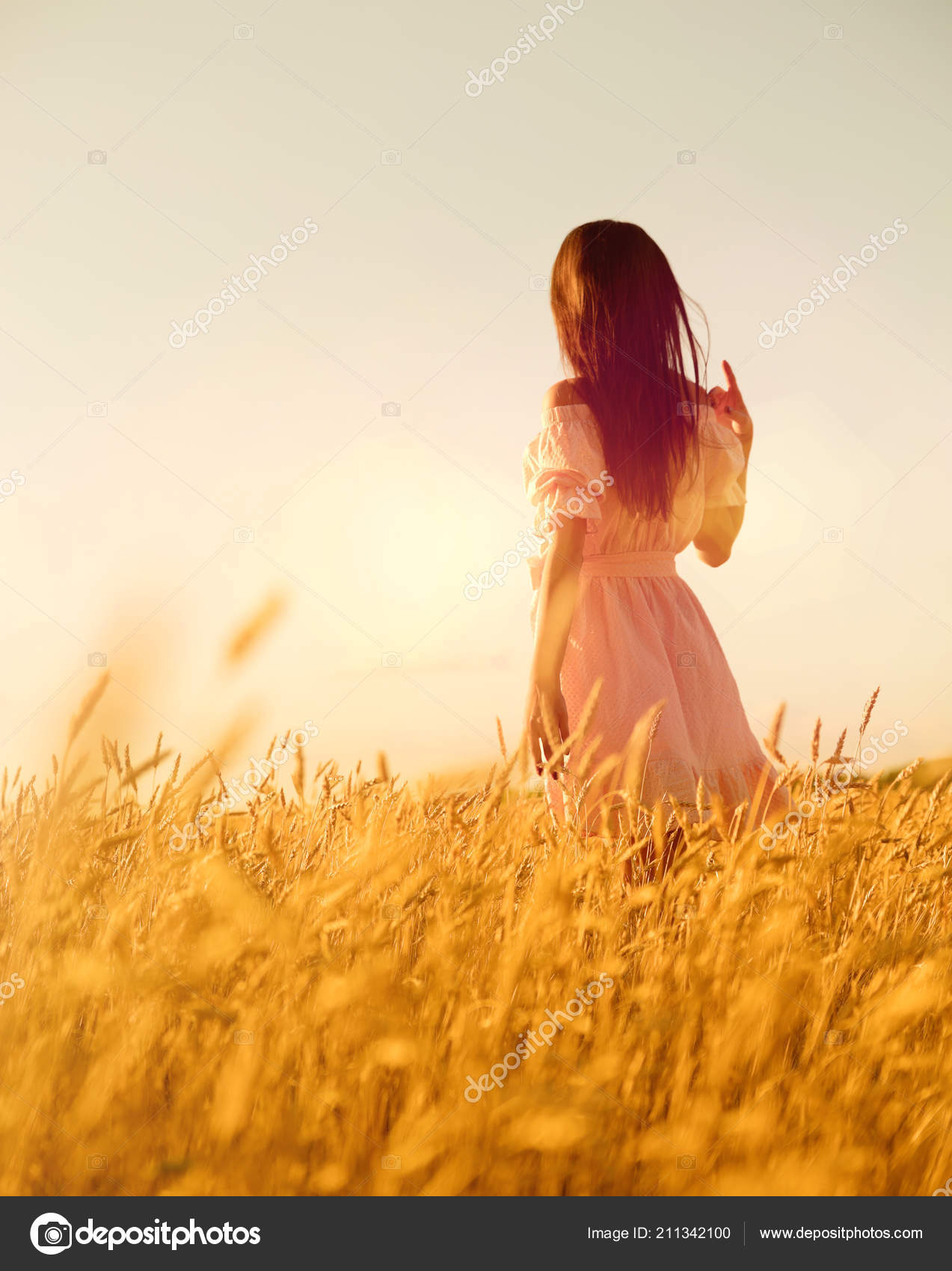 girl in field sunset