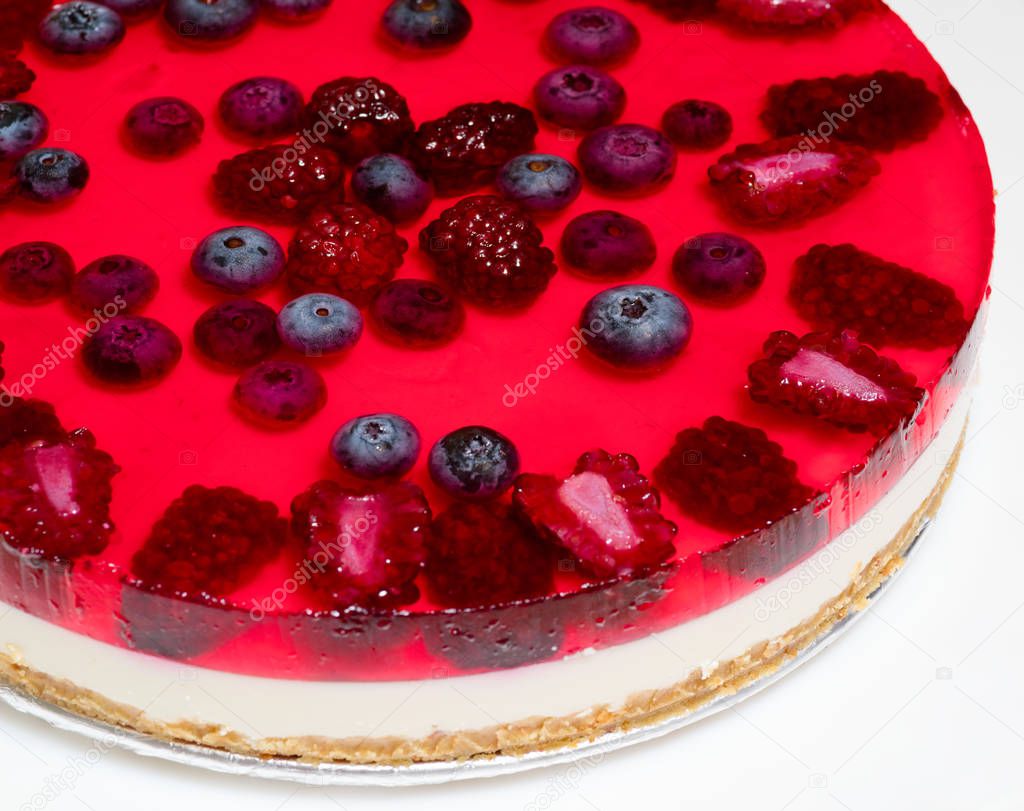 Red cheesecake with wild berries