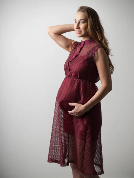 Jeune femme enceinte (couleur ver ) — Photo