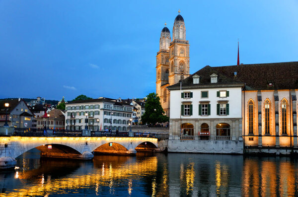 Grossmunster cathedral in river Limmat, Zurich