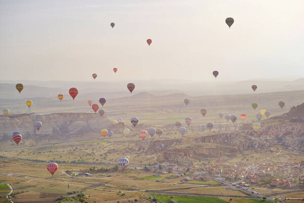 Cappadocia, Turkey - May 04, 2014: Hot air balloons flying at Cappadocia area 