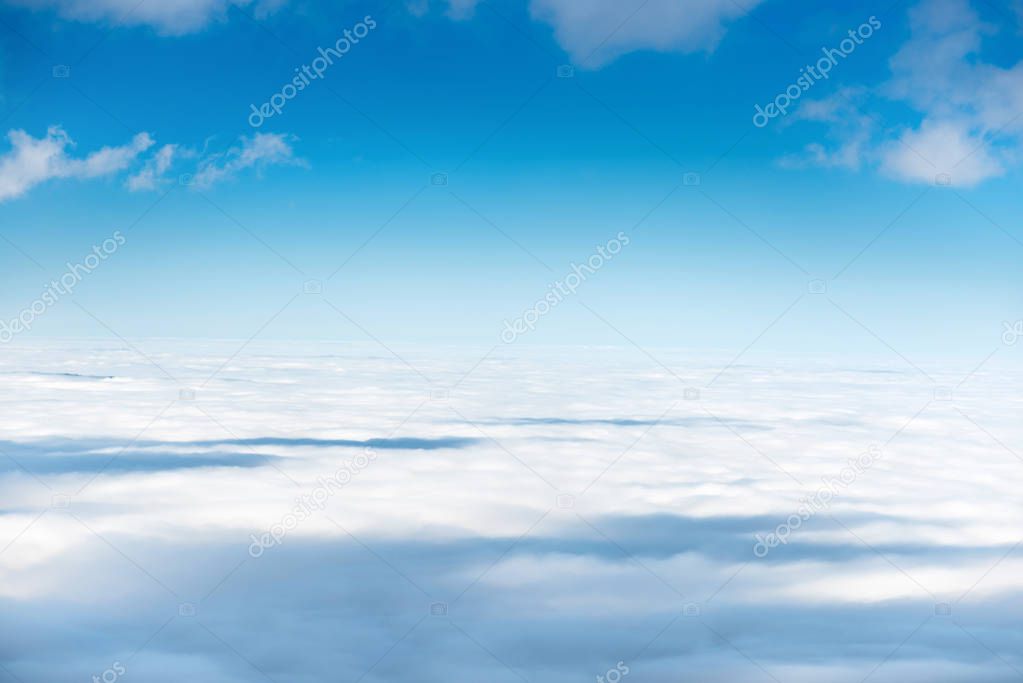 White clouds on the blue sky as nature background