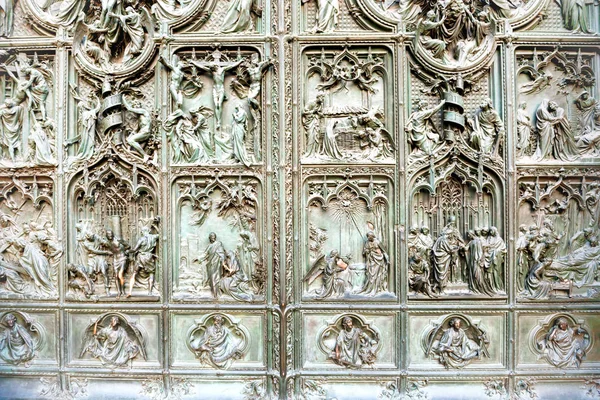 Forged doors with bronze bas reliefs at facade of cathedral Duomo di Milano. Italy — Stock Image Forged Doors Bronze Bas Reliefs Facade Cathedral Duomo Milano Italy Royalty Free Stock Photos