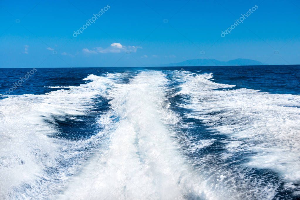 Wave from boat on water surface