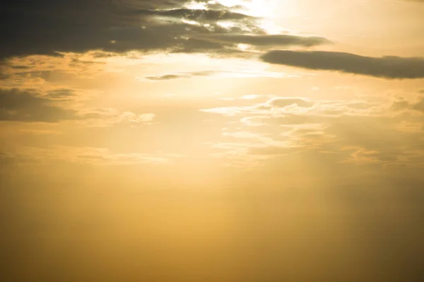 Sunset orange sky with sun and clouds — Stock Photo, Image